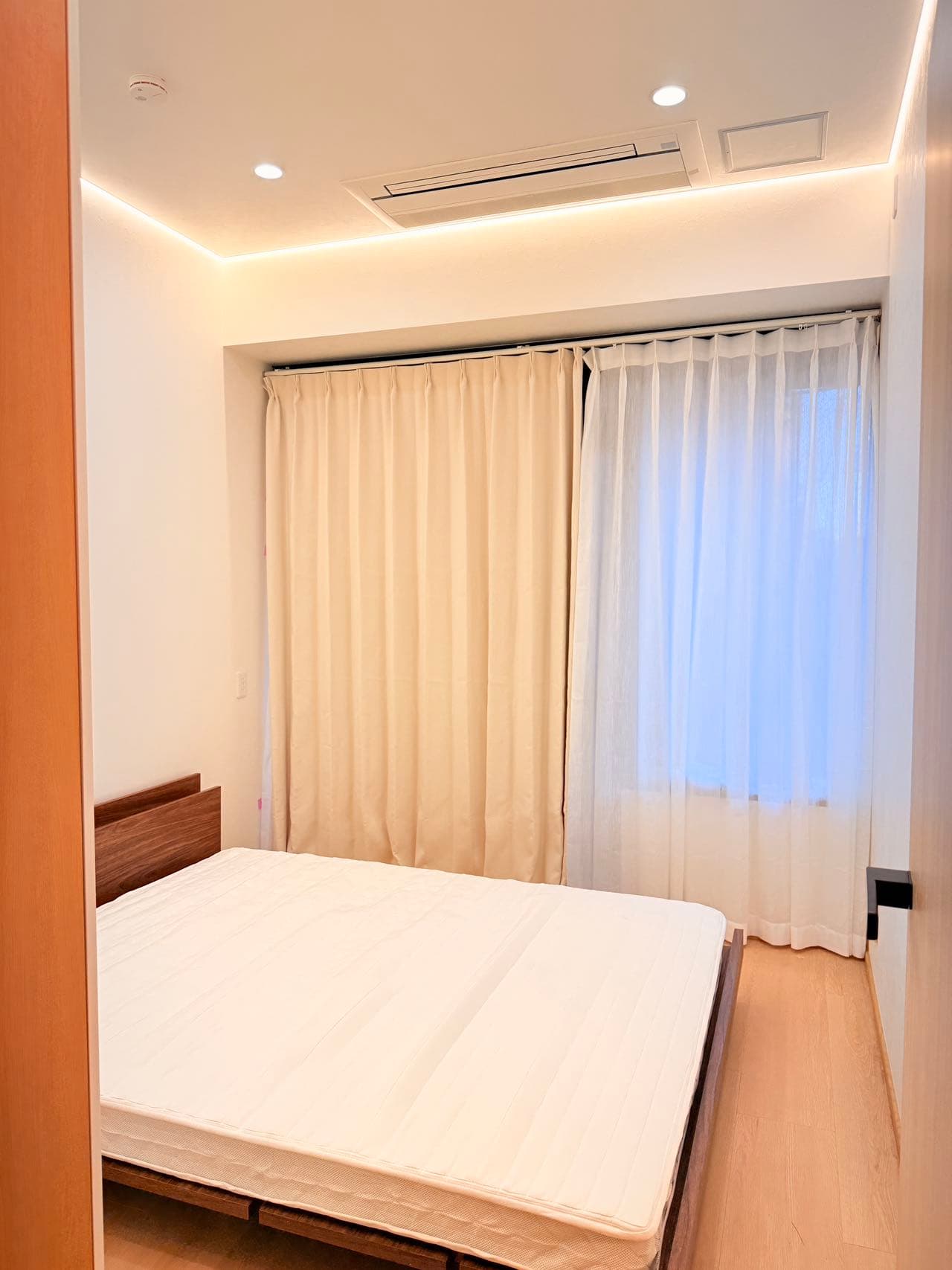 Bedroom with full curtains